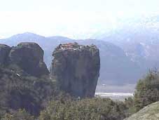 Note the monastery on top of the centre rock in Meteora